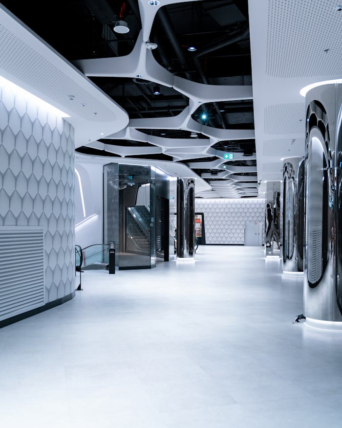 services-01 Discover the sleek and modern interior design of the Warsaw Hub with futuristic elements.